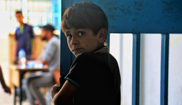 War Child in Gaza_oPt_Boy looking into camera_OCHA_Mohammad_Libed_210519