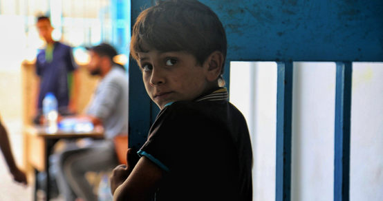 War Child in Gaza_oPt_Boy looking into camera_OCHA_Mohammad_Libed_210519