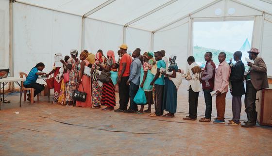 Burundian refugees standing in line for registration_War Child Uganda_190917