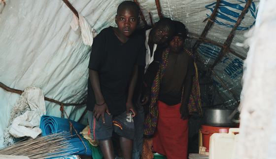 Refugee Roger with his parents in their house_War Child Uganda_190918.jpg