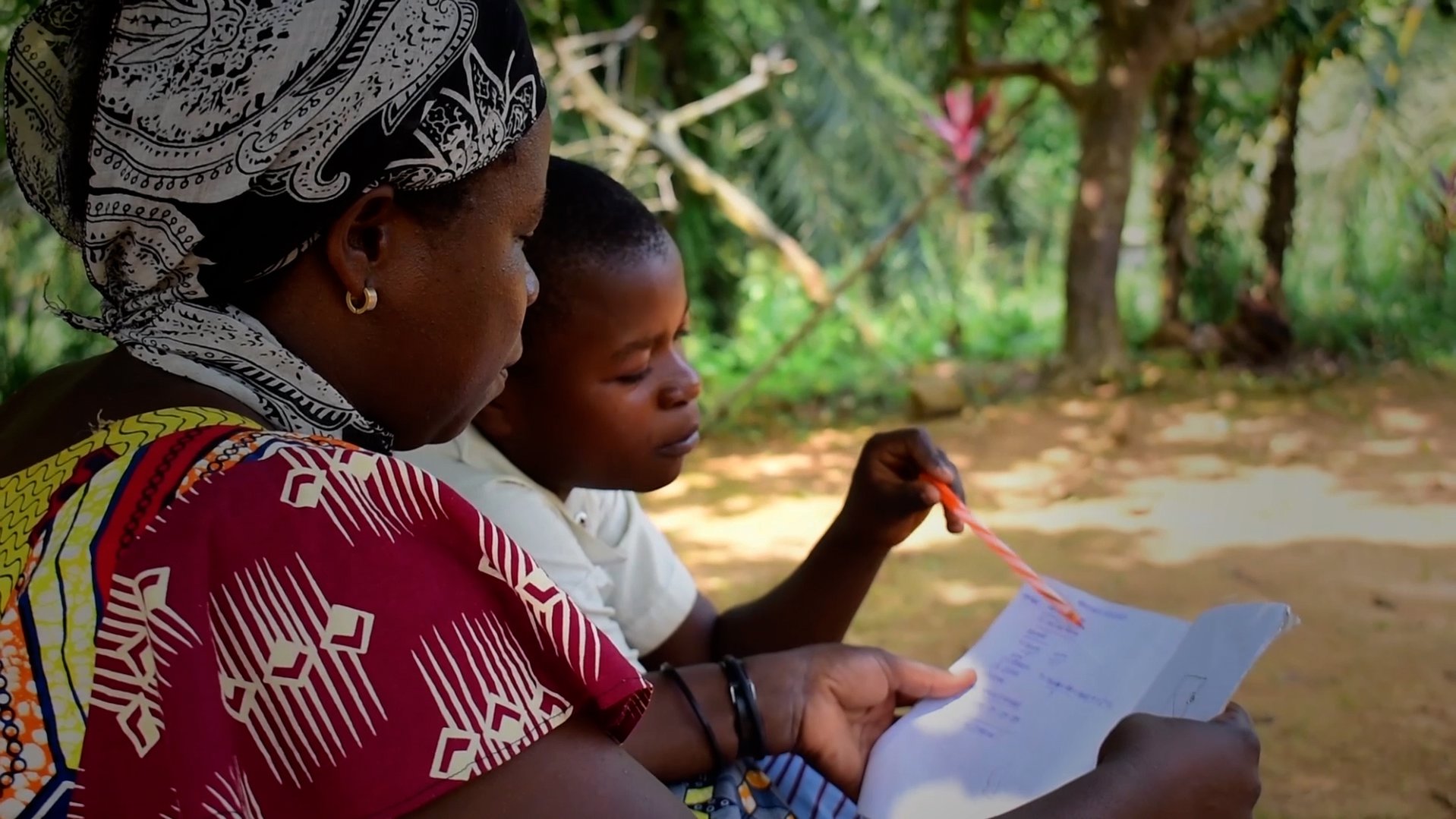 Lamegie, a 12 years old girl Studying in DRC