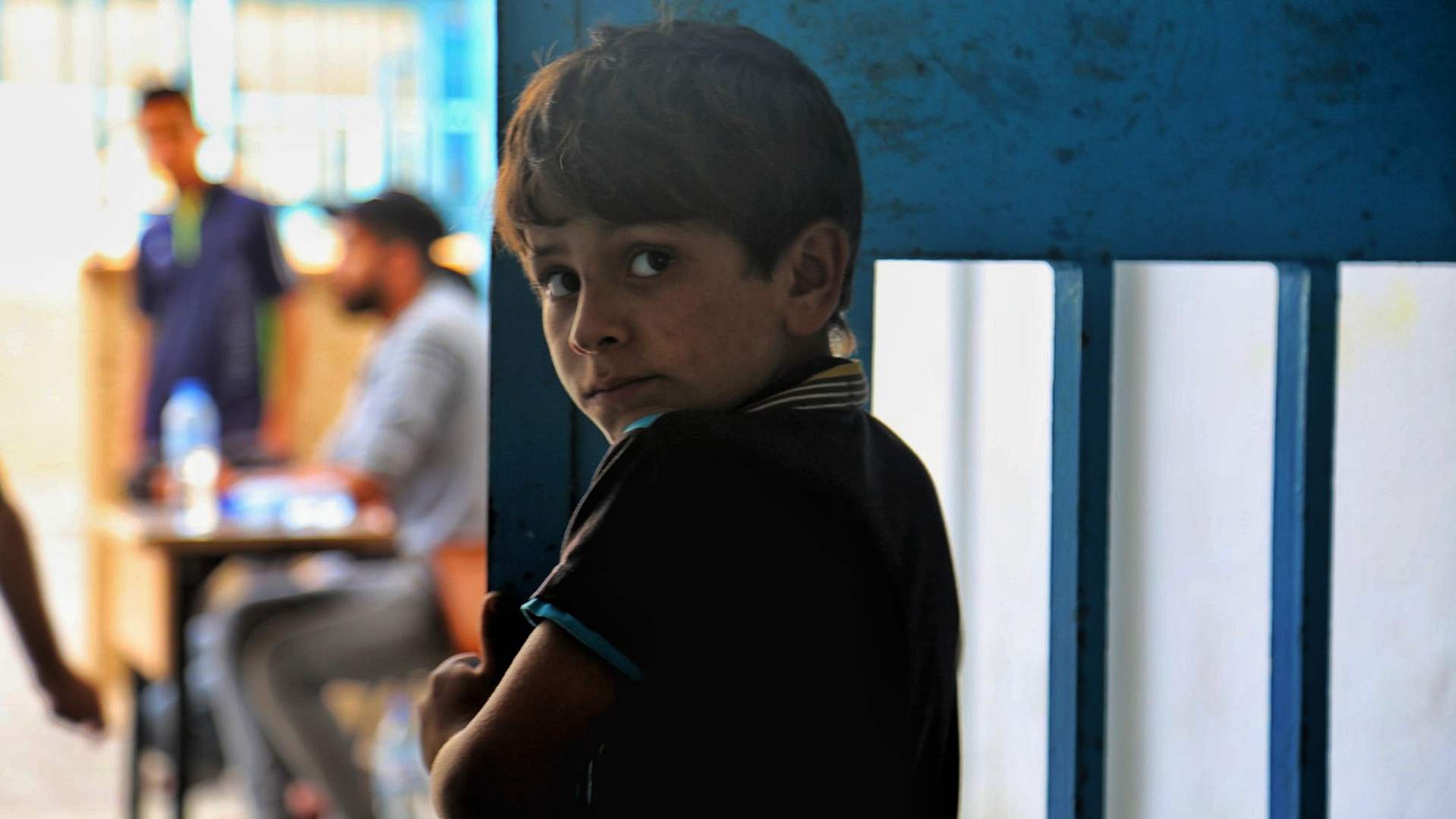 War Child in Gaza - oPt - Boy looking into camera - OCHA
