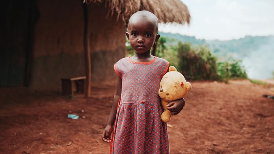 Girl with cuddly bear in Uganda_190419