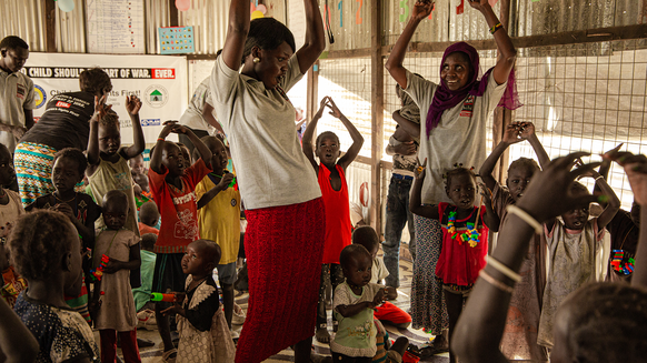 War Child facilitators with children in South Sudan