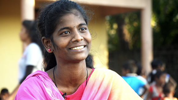 War Child TeamUp in Sri Lanka - girl looking into the camera