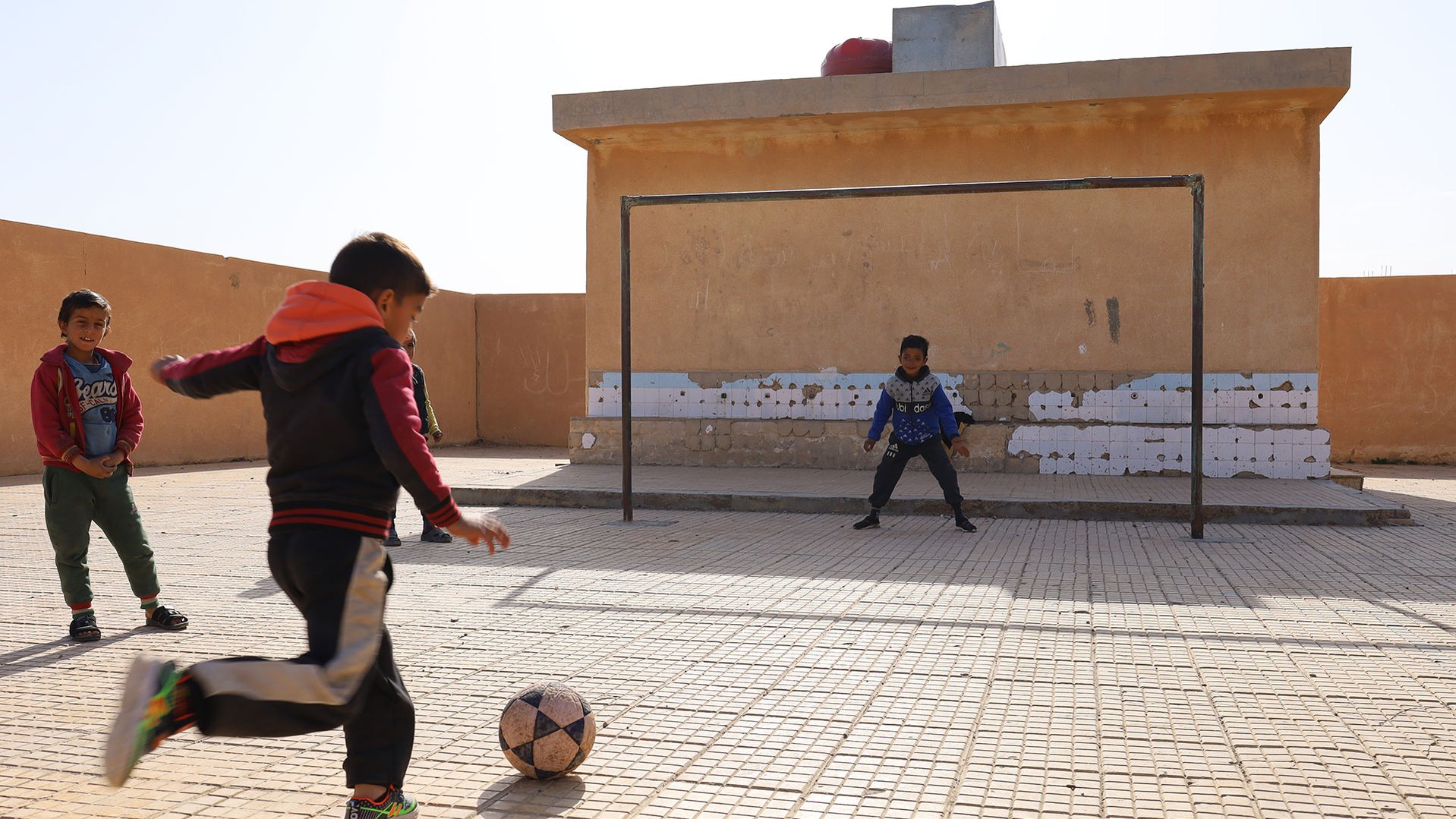 Muhammed from Syria is safely playing outside with his friends he met at War Child Holland's programmes