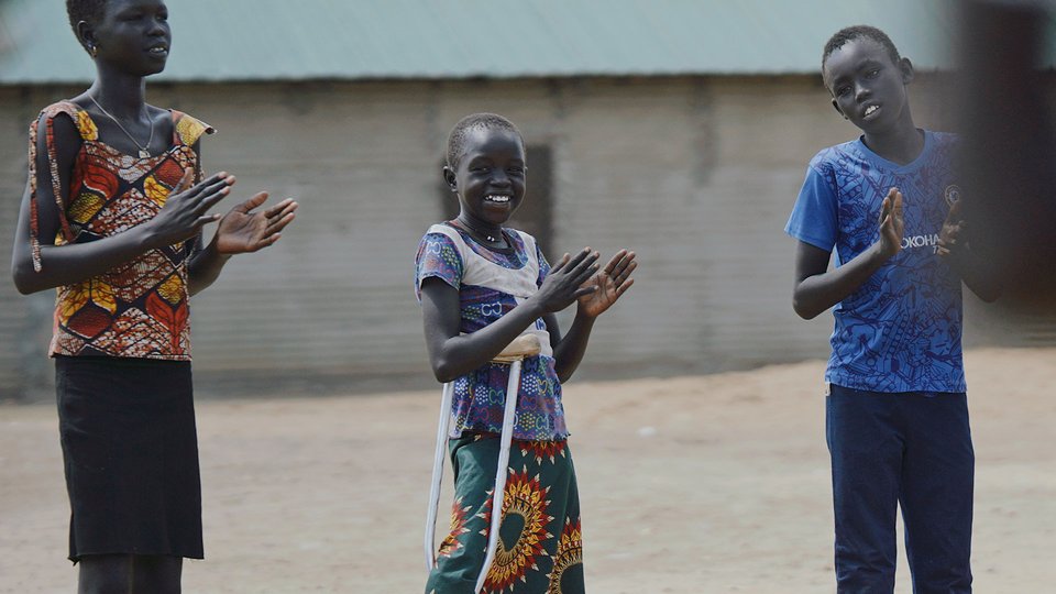 South Sudanese Adit loves to play and move with her friends during TeamUp's sport and play activities from War Child